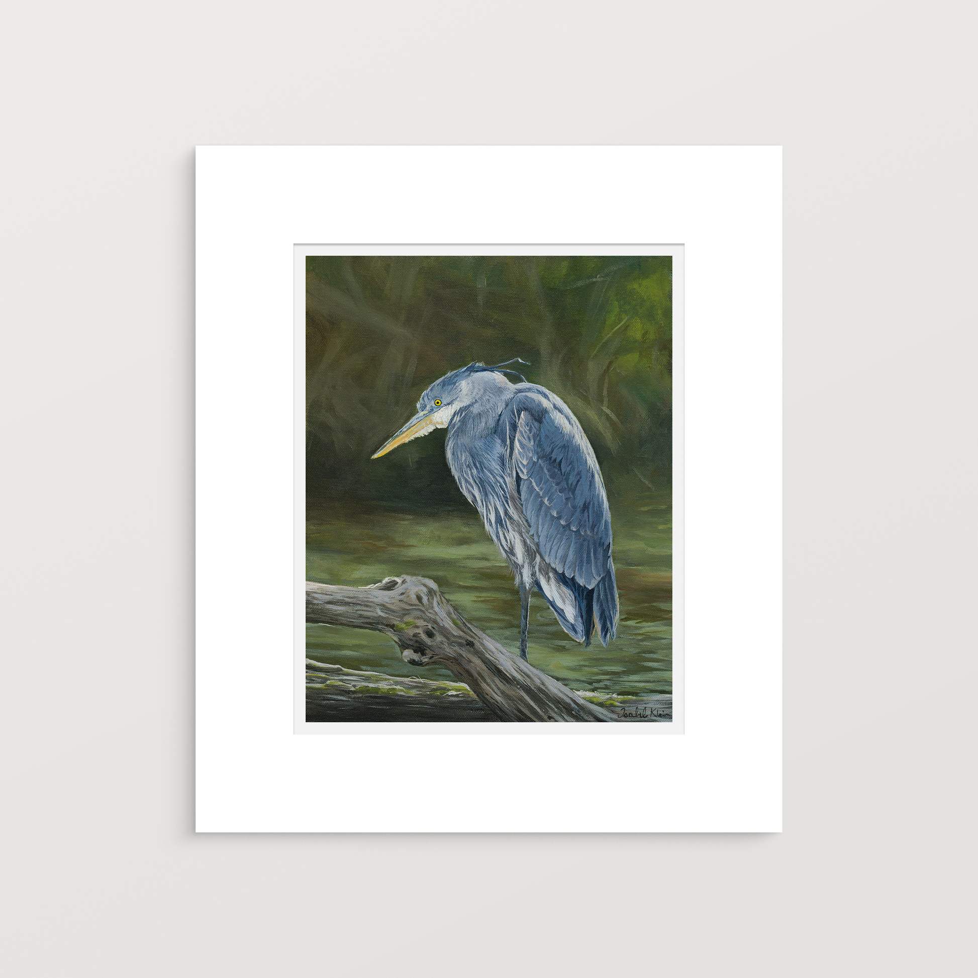 A matted art print featuring a painted blue heron standing on a log in a wetland scene, shown against a light gray background.