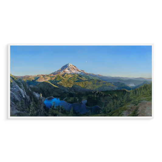 A print of an acrylic painting propped against a white wall.

The painting is a vibrant realistic landscape of Mount Rainier in the summer. It overlooks Mowich Lake. The sun is setting, casting golden light on the mountain and surrounding hills. The moon can be seen faintly beyond the mountain.