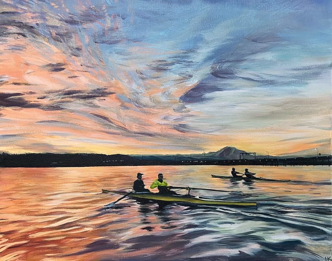 A colorful acrylic painting of two 2-man rowing shells on Lake Washington in Seattle. The sunrise illuminates the scene with bright yellows, oranges, and purples. A floating bridge and Mount Rainier are seen off to the distance.